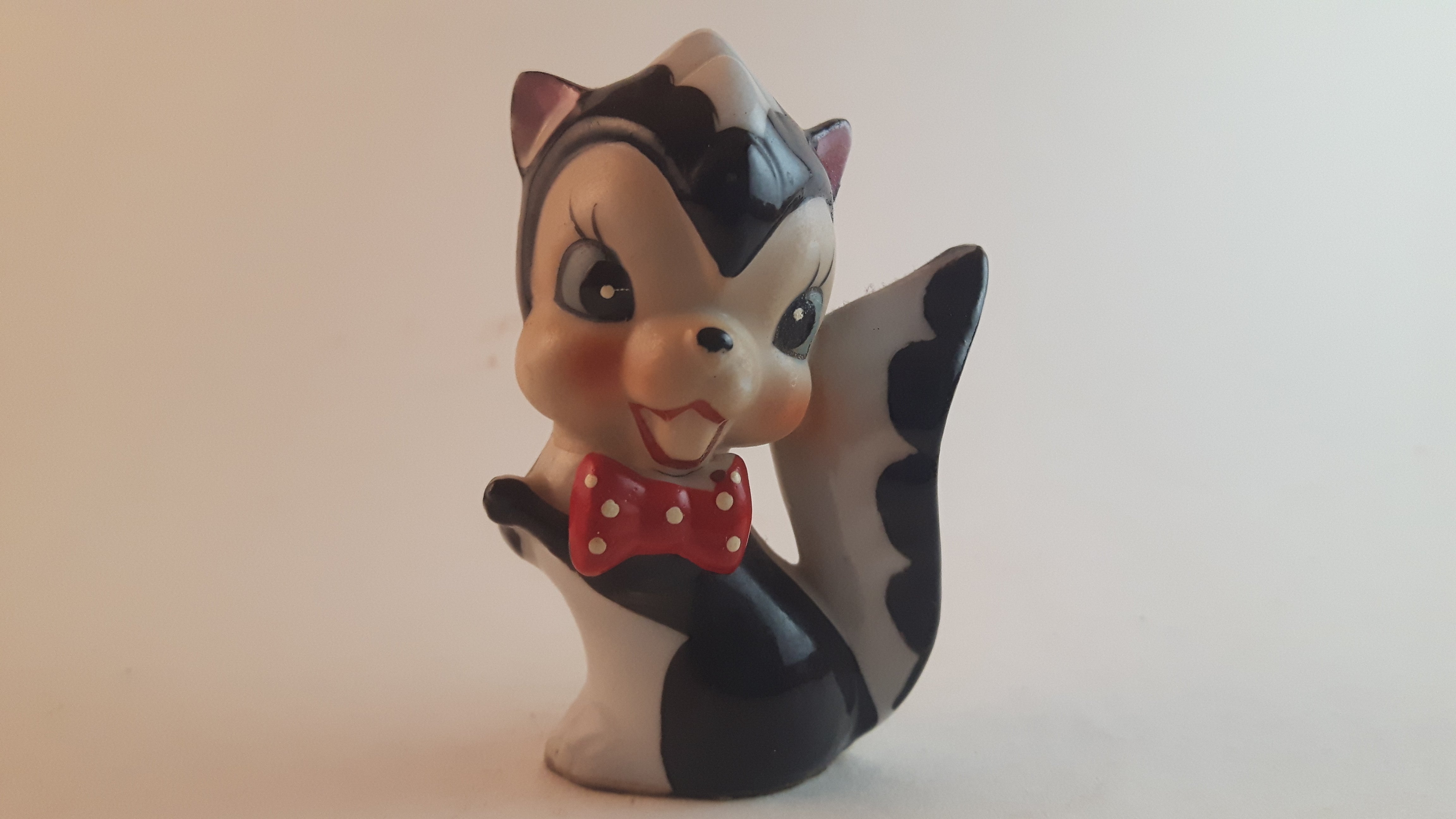 Vintage 1940-50s Porcelain Little Stinker Animal Skunk With Red Bow Figurine Made in Japan