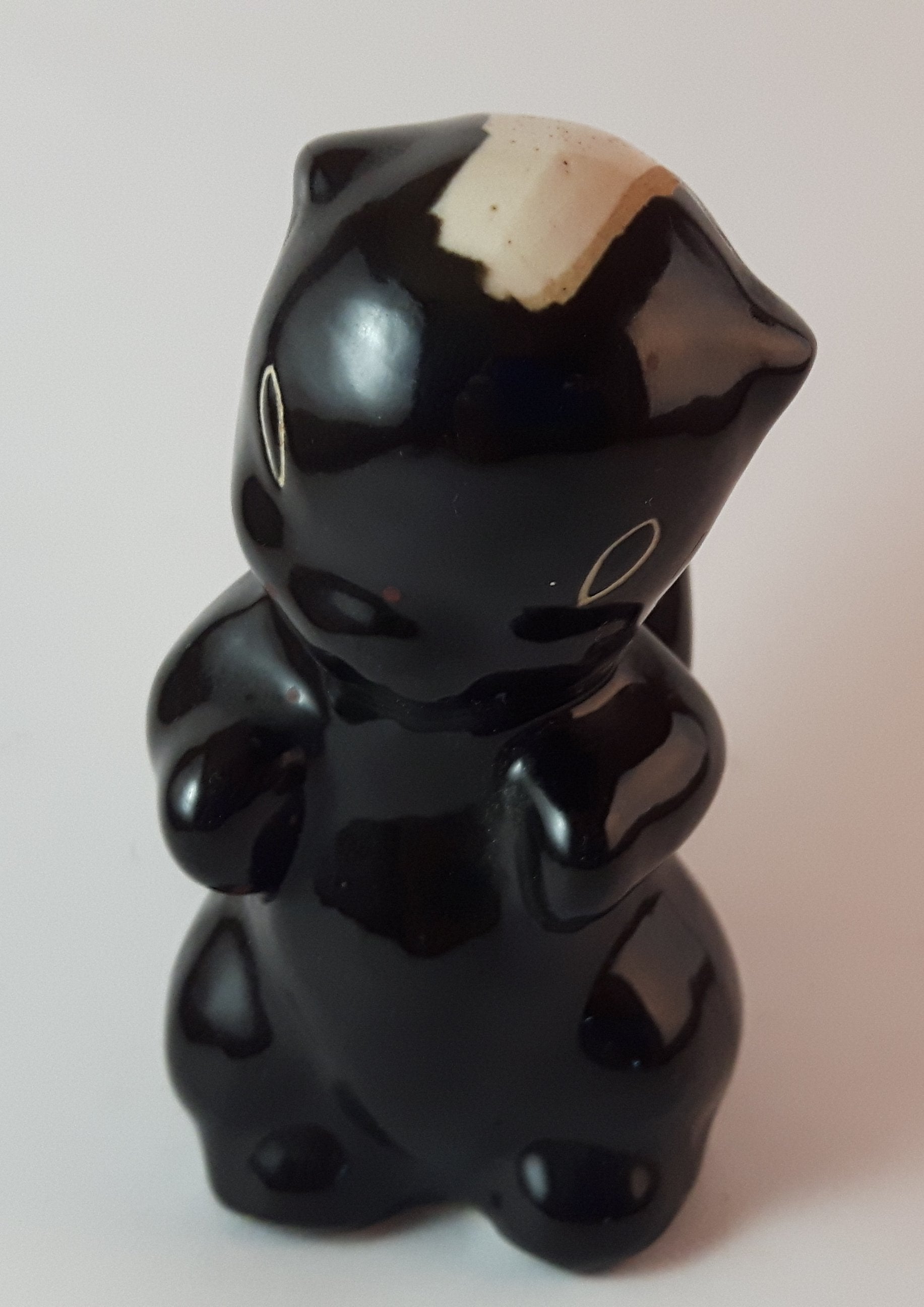 Vintage 1950s Ceramic White Stripe Sitting Skunk Figurine California Pottery