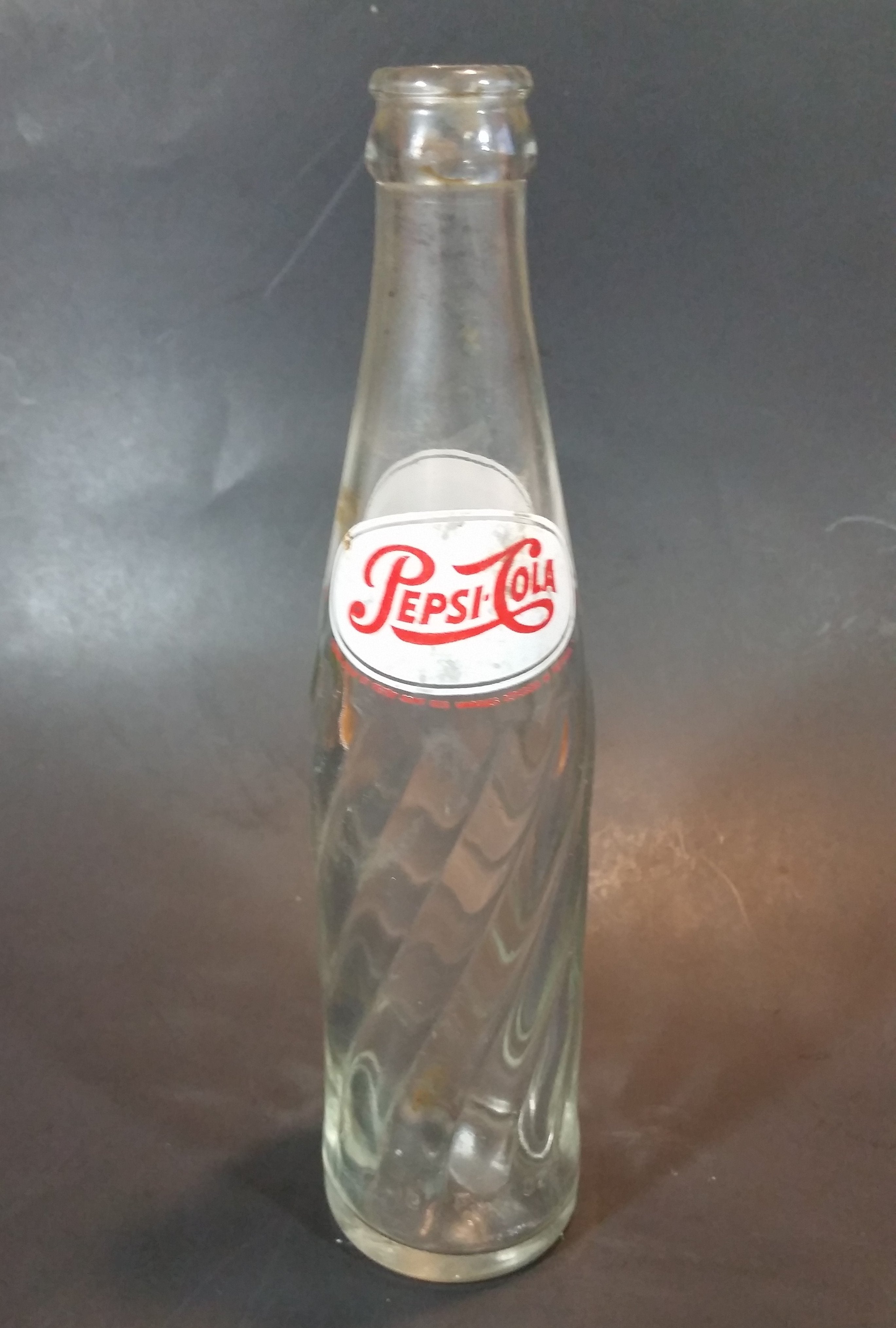 1973 Dual Logo Pepsi-Cola Pepsi 10 Fl oz. Clear Twist Soda Pop Bottle