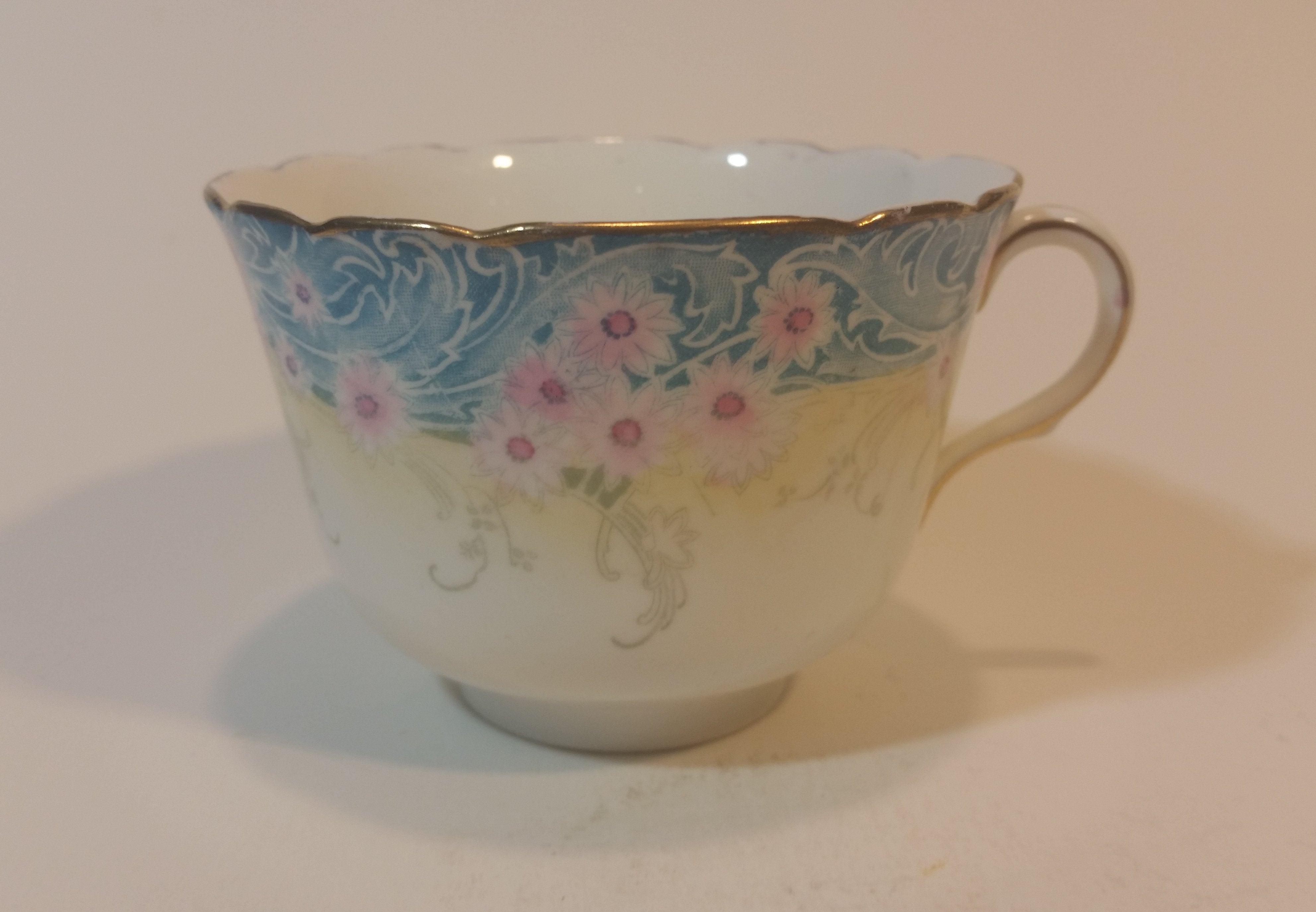 1891-1894 Doulton Burslem England Floral with Gold Gilt Teacup