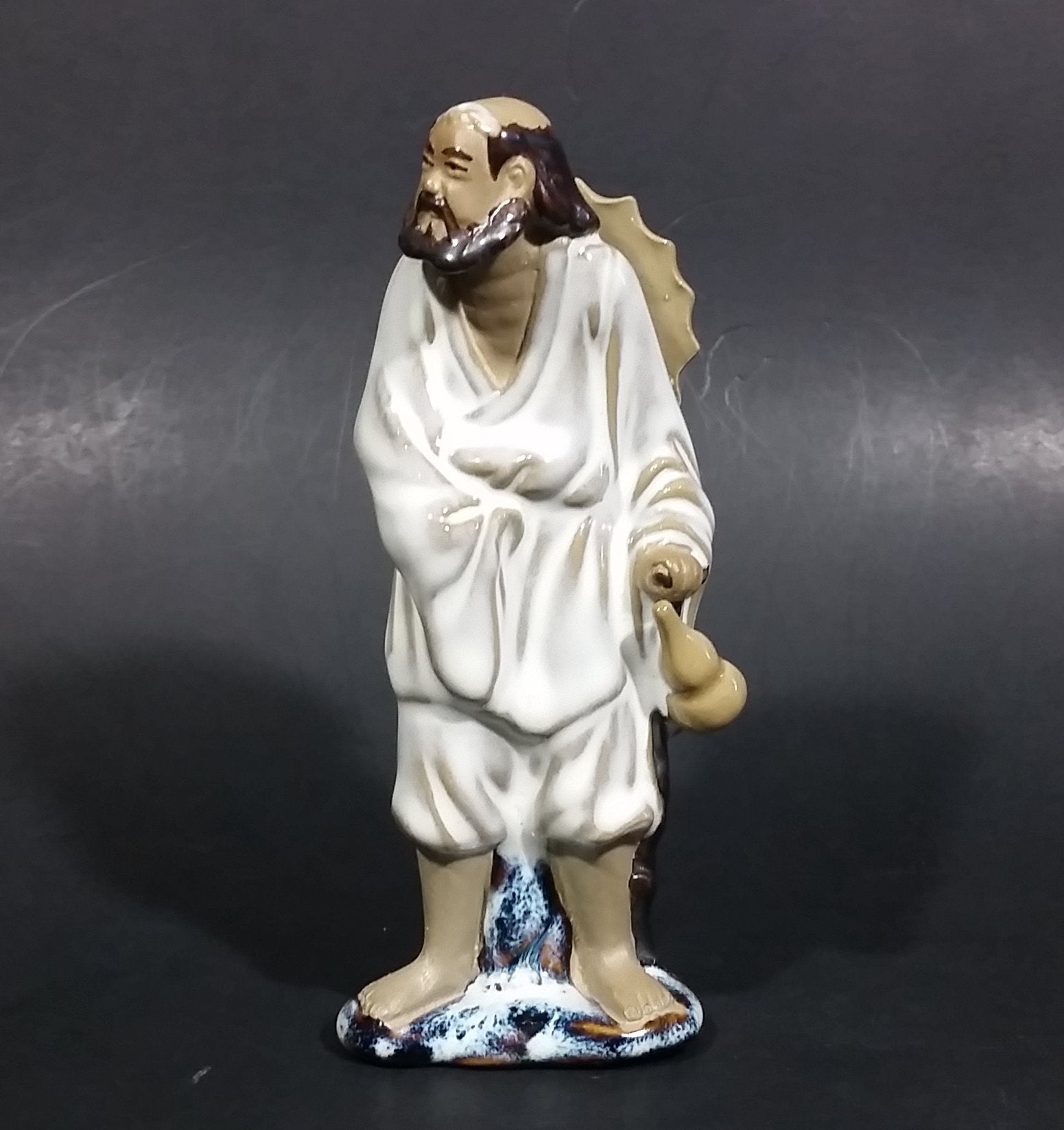 Vintage Balding Man with a Beard in a White Robe With a Tan Hat Ceramic Figurine