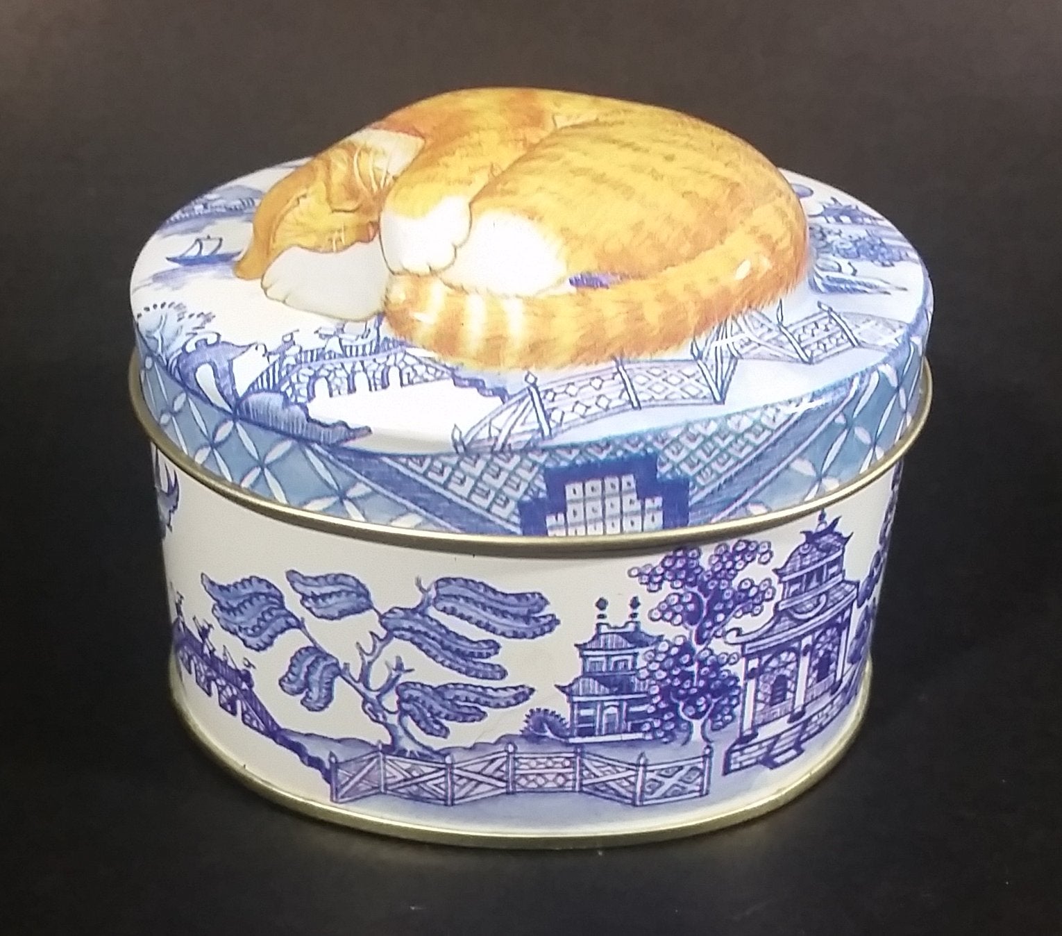 Collectible Blue Willow Blue and White Tin With Orange and White Sleeping Kitty Cat