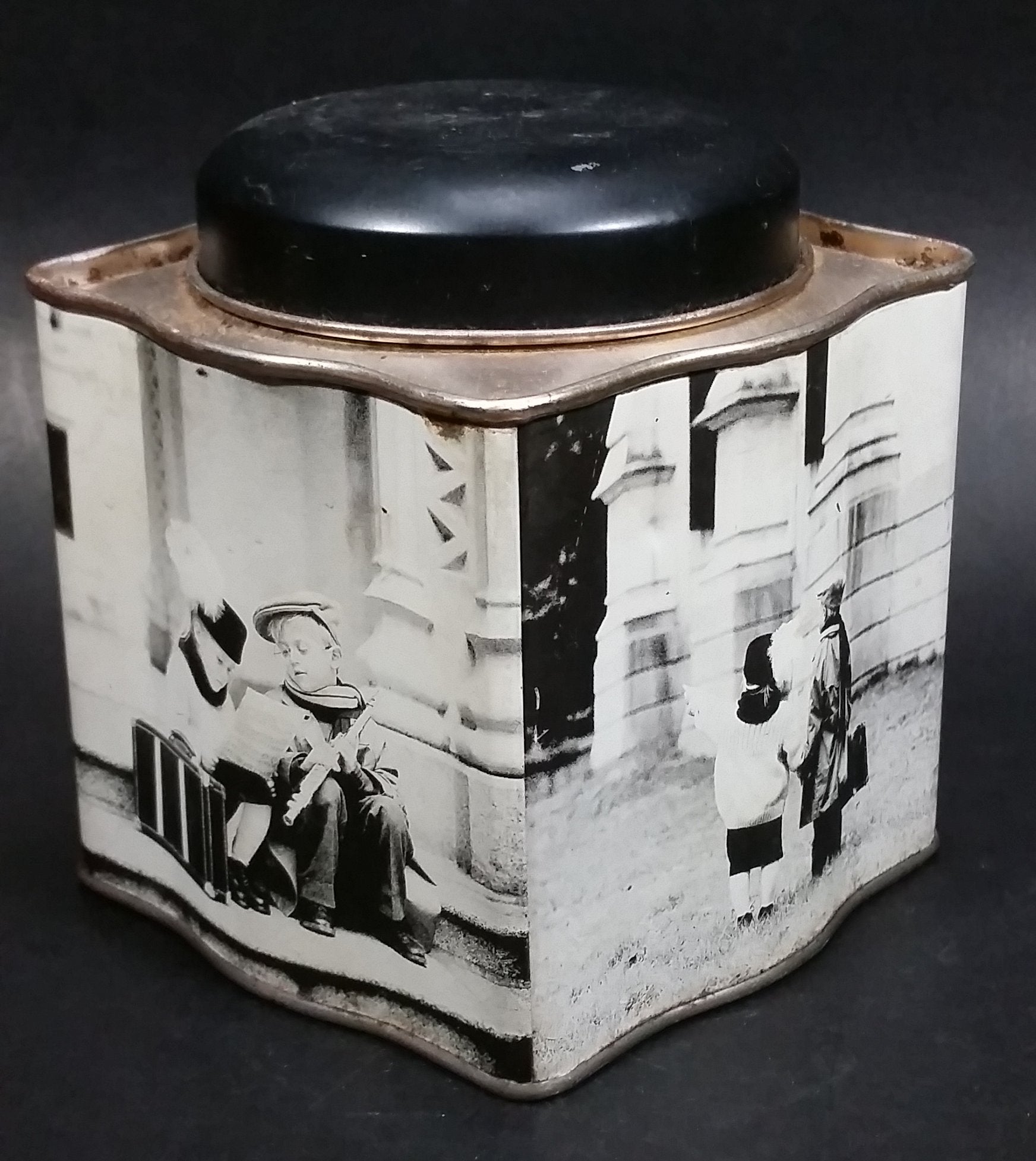 Black and White Photograph Cocoa Storage Tin of a Boy and a Girl Sitting in Different Scenes 4