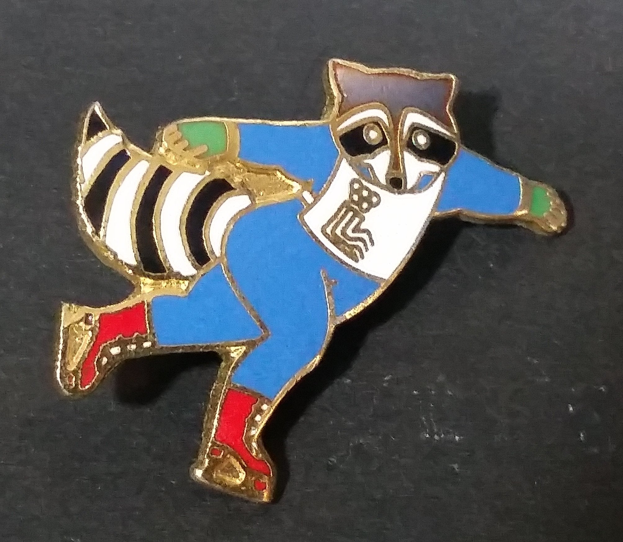 Collectible 1980 Roni Raccoon Character Lake Placid Winter Olympics Ice Figure Skating Enamel Pin