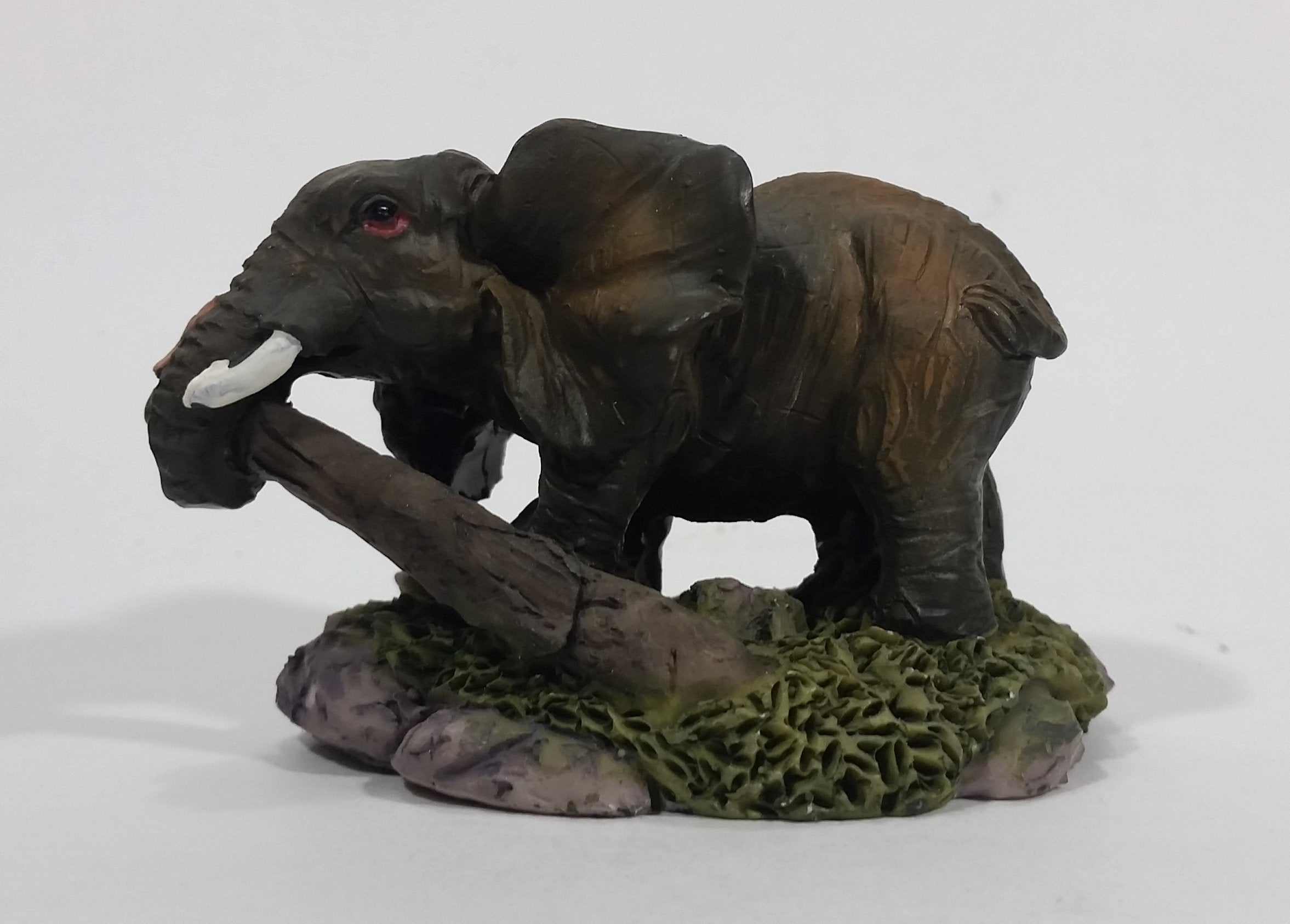 Elephant with Tusks Pulling a Log With It's Trunk Resin Figurine - SABRE