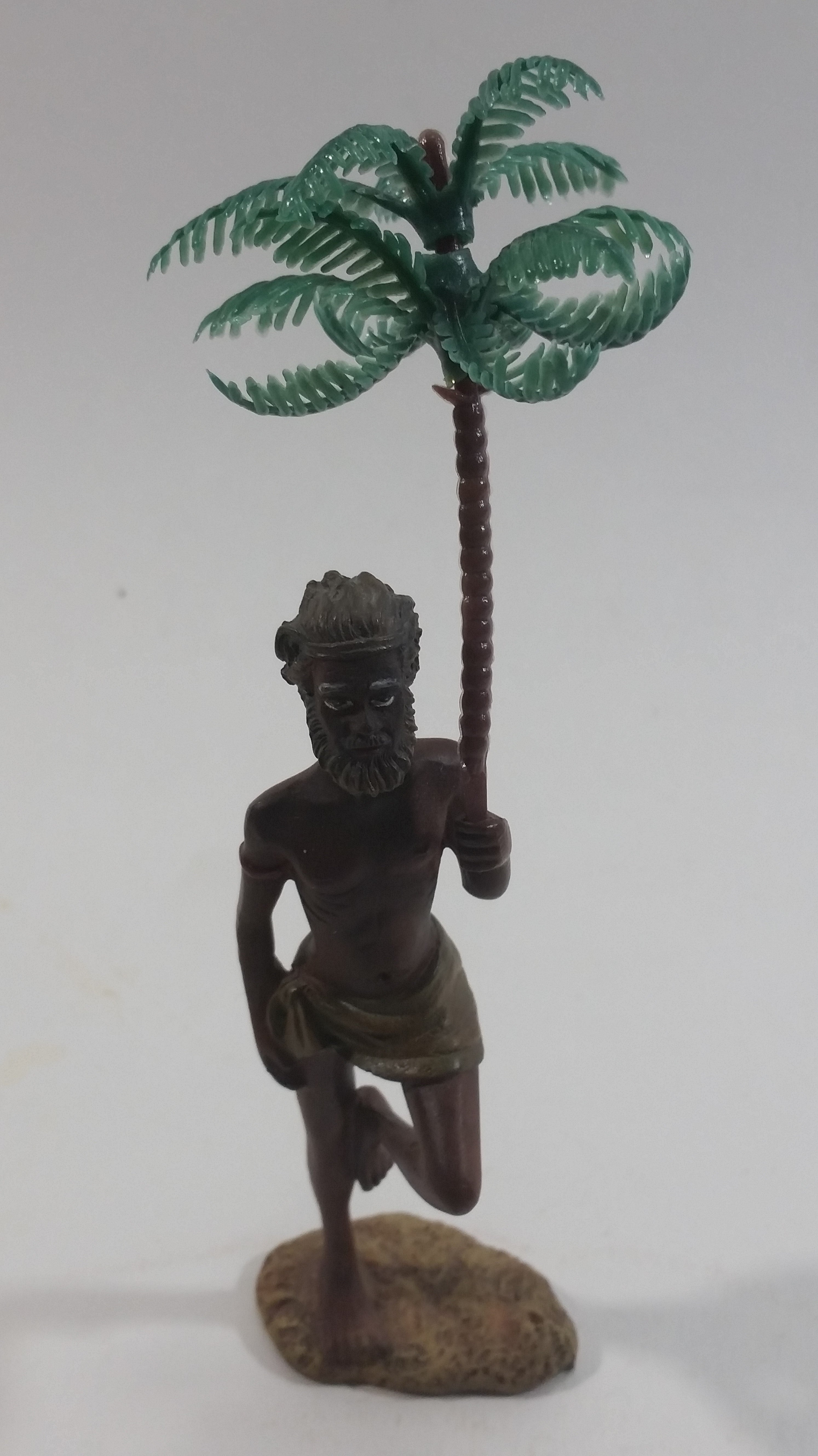 Man Holding a Palm Tree Umbrella While Standing on One Foot Resin and Plastic Figurine 2