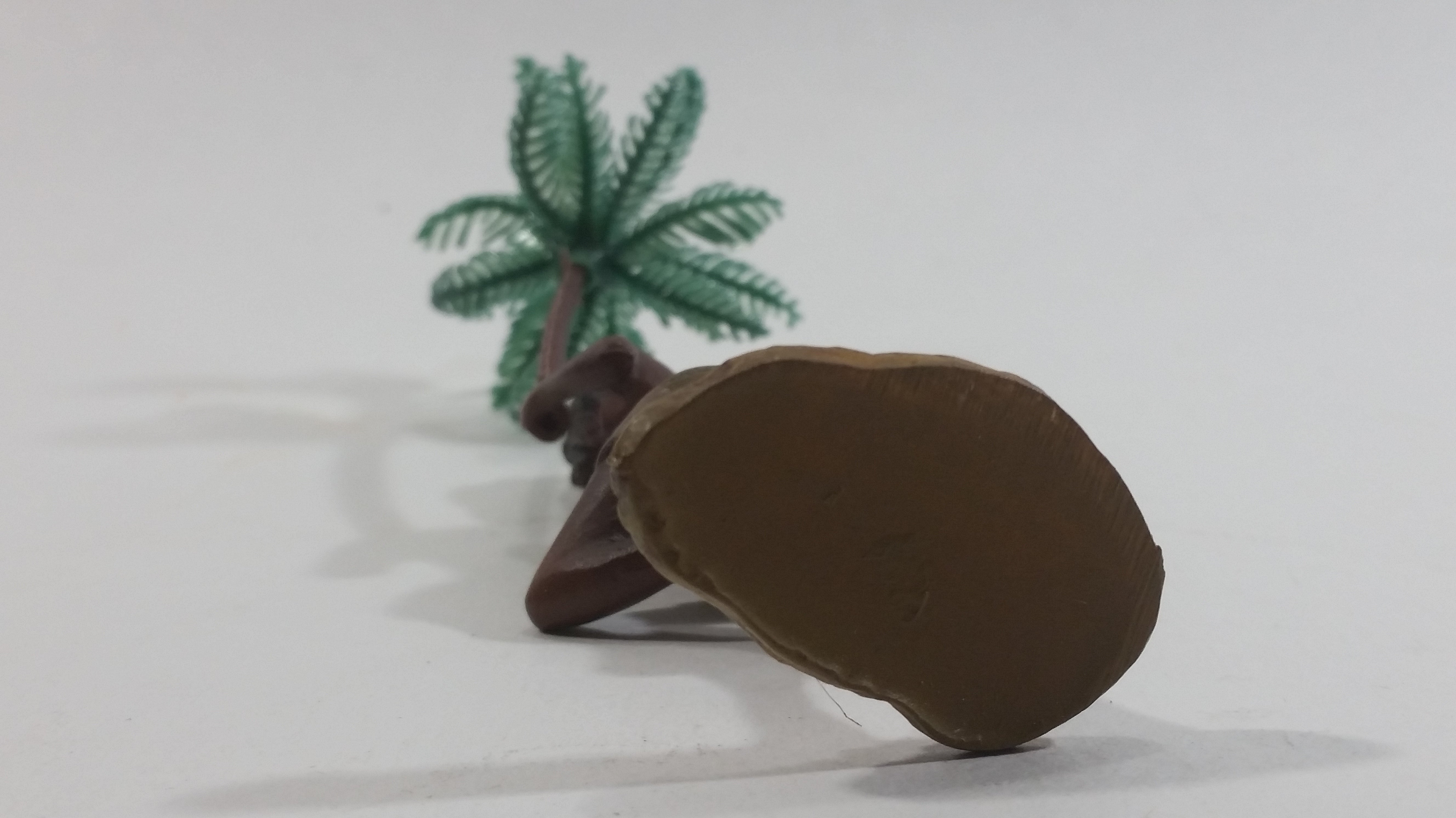 Man Holding a Palm Tree Umbrella While Standing on One Foot Resin and Plastic Figurine 7