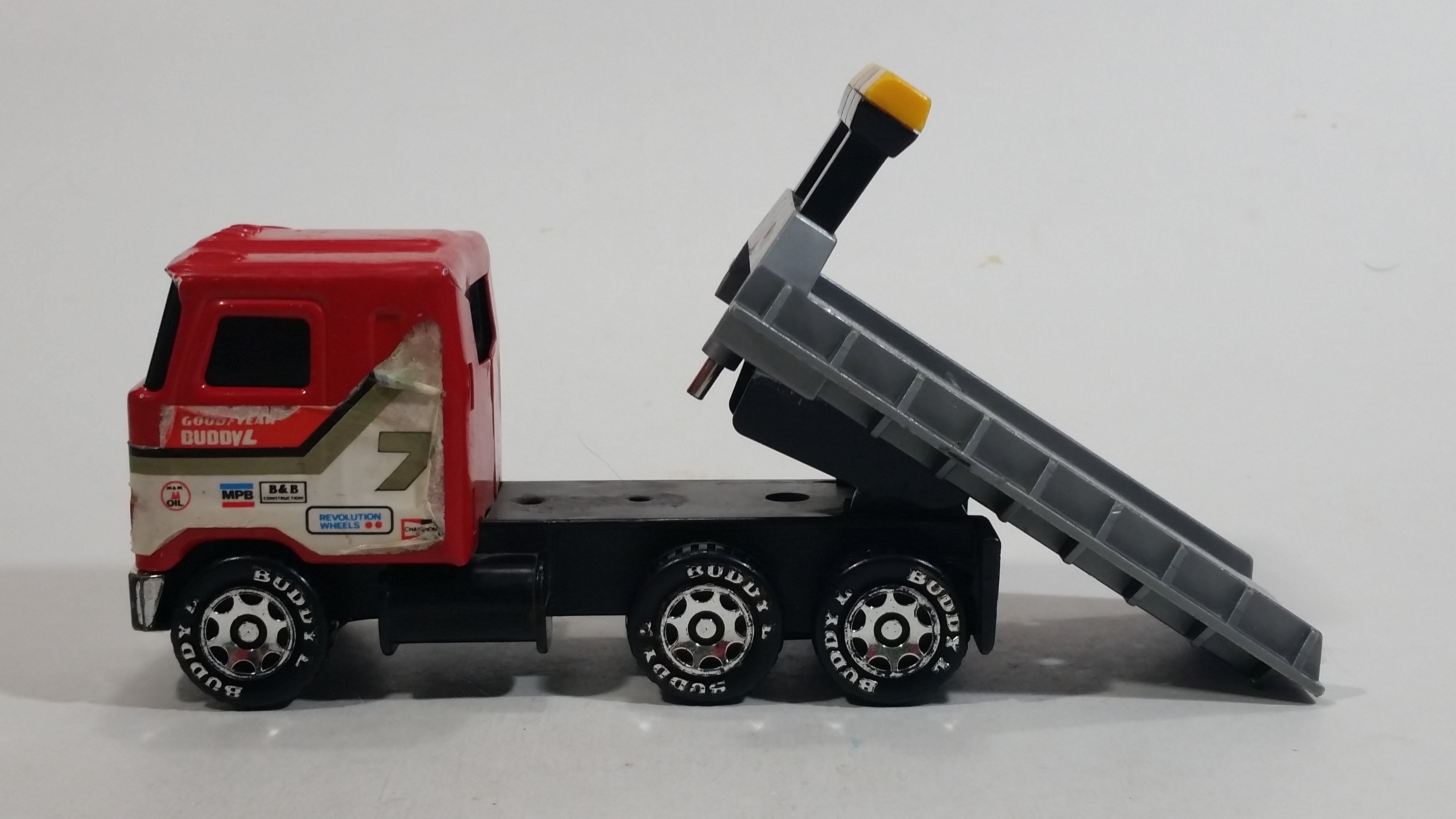 Vintage 1980 Buddy L Mack Semi Good Year #7 Flatbed Tow Truck Red and Grey Pressed Steel and Plastic Toy Car Wrecking Salvage Vehicle - Macau 3