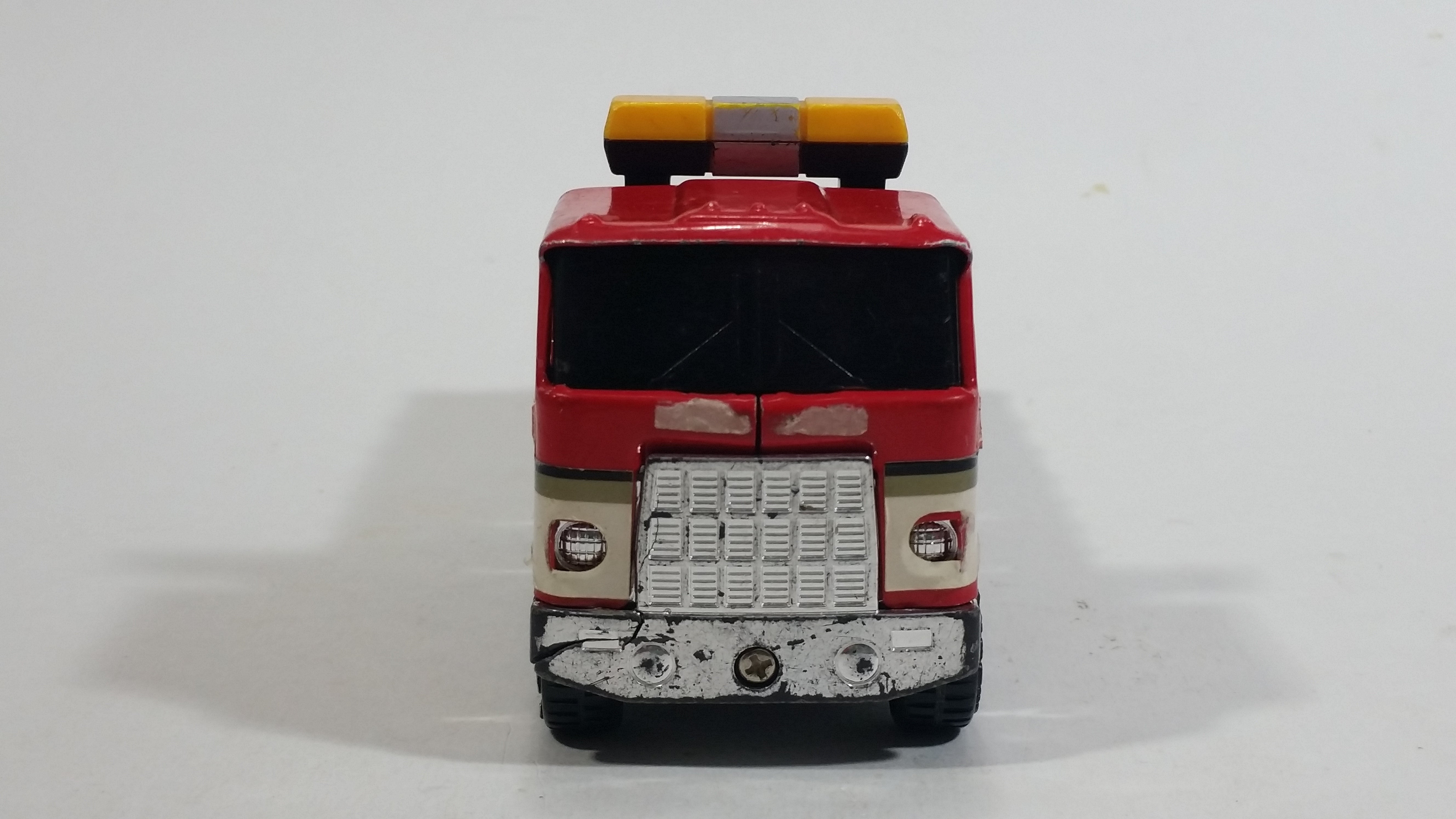 Vintage 1980 Buddy L Mack Semi Good Year #7 Flatbed Tow Truck Red and Grey Pressed Steel and Plastic Toy Car Wrecking Salvage Vehicle - Macau 6