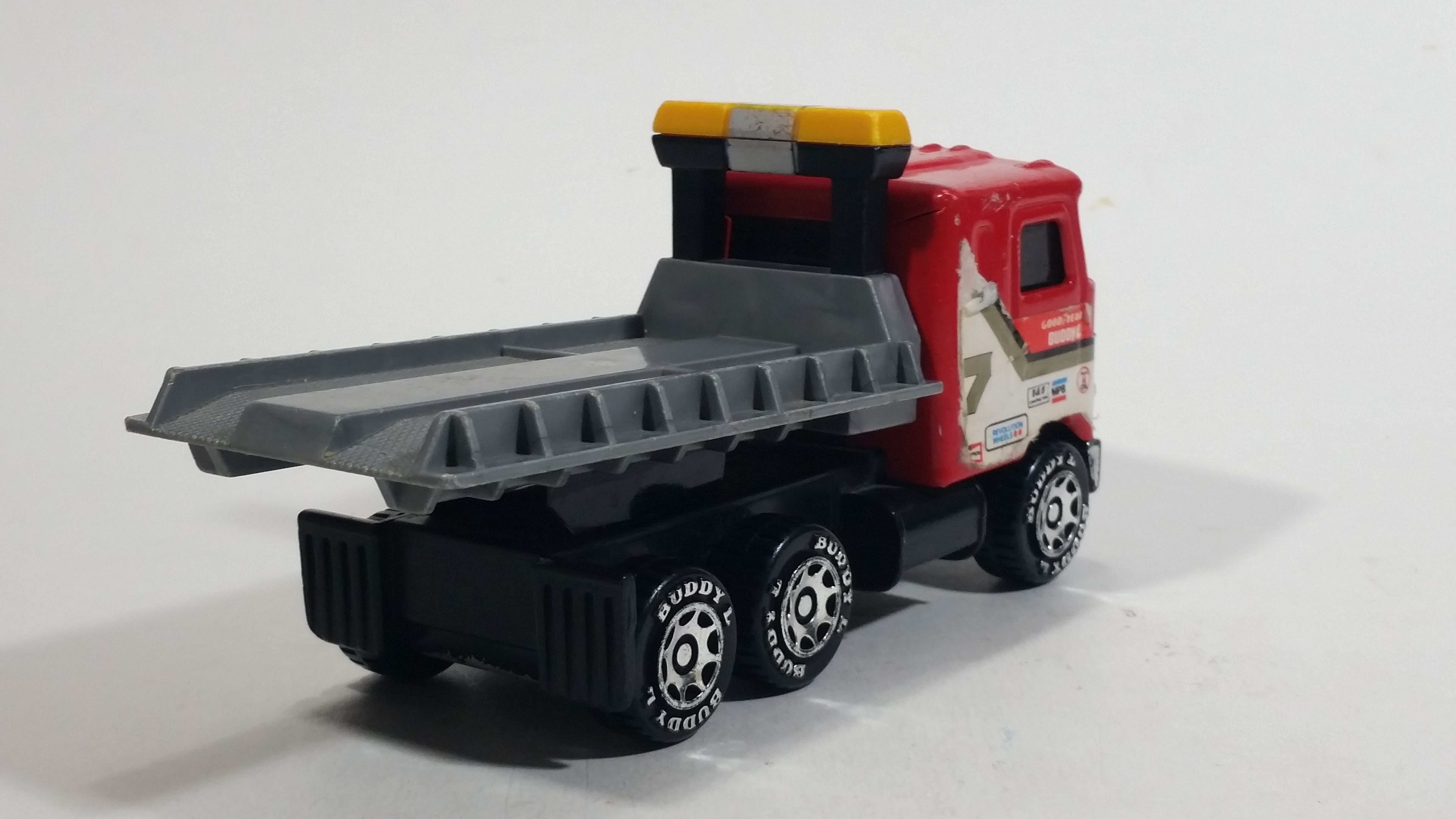 Vintage 1980 Buddy L Mack Semi Good Year #7 Flatbed Tow Truck Red and Grey Pressed Steel and Plastic Toy Car Wrecking Salvage Vehicle - Macau 9