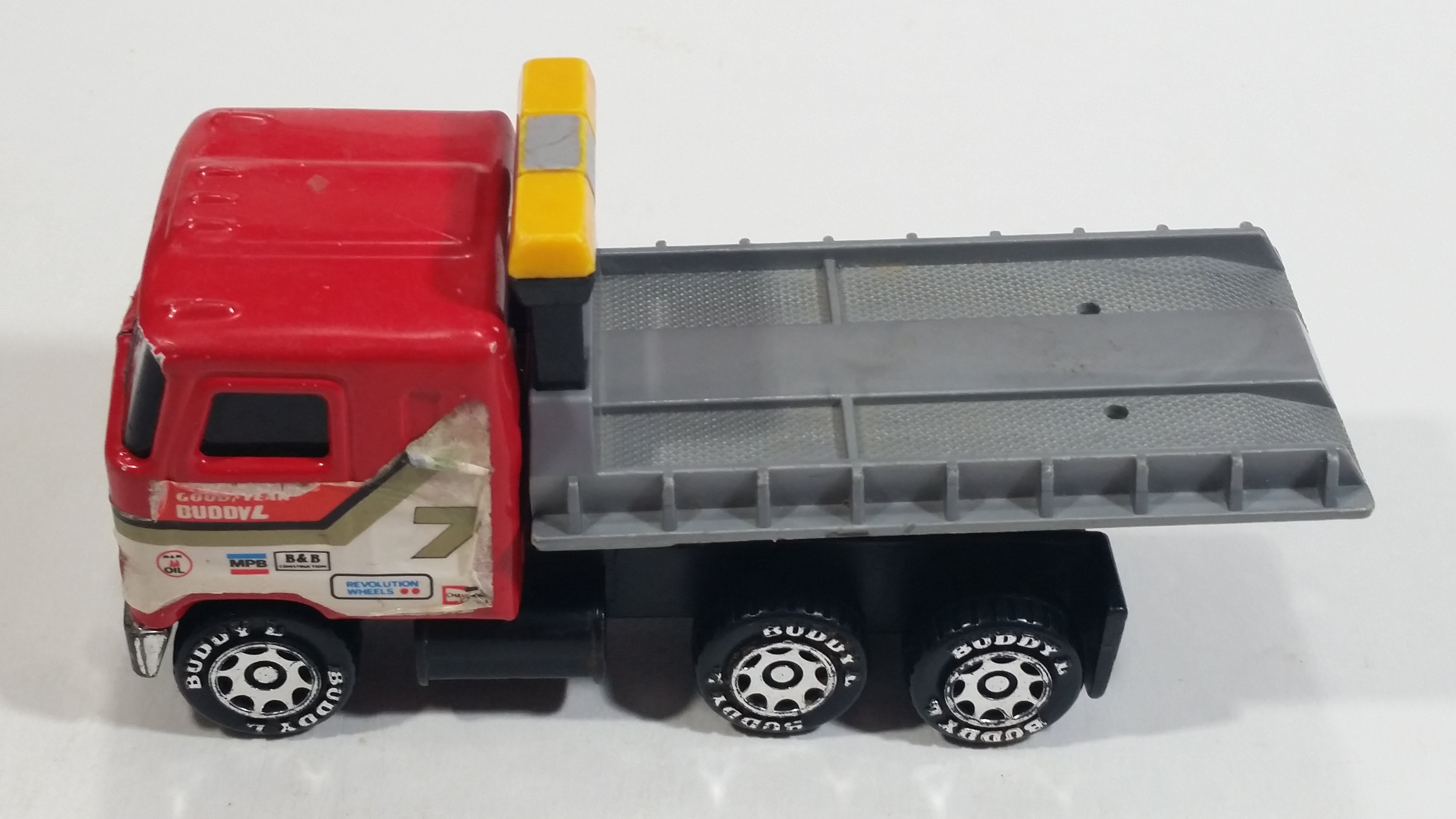 Vintage 1980 Buddy L Mack Semi Good Year #7 Flatbed Tow Truck Red and Grey Pressed Steel and Plastic Toy Car Wrecking Salvage Vehicle - Macau 12