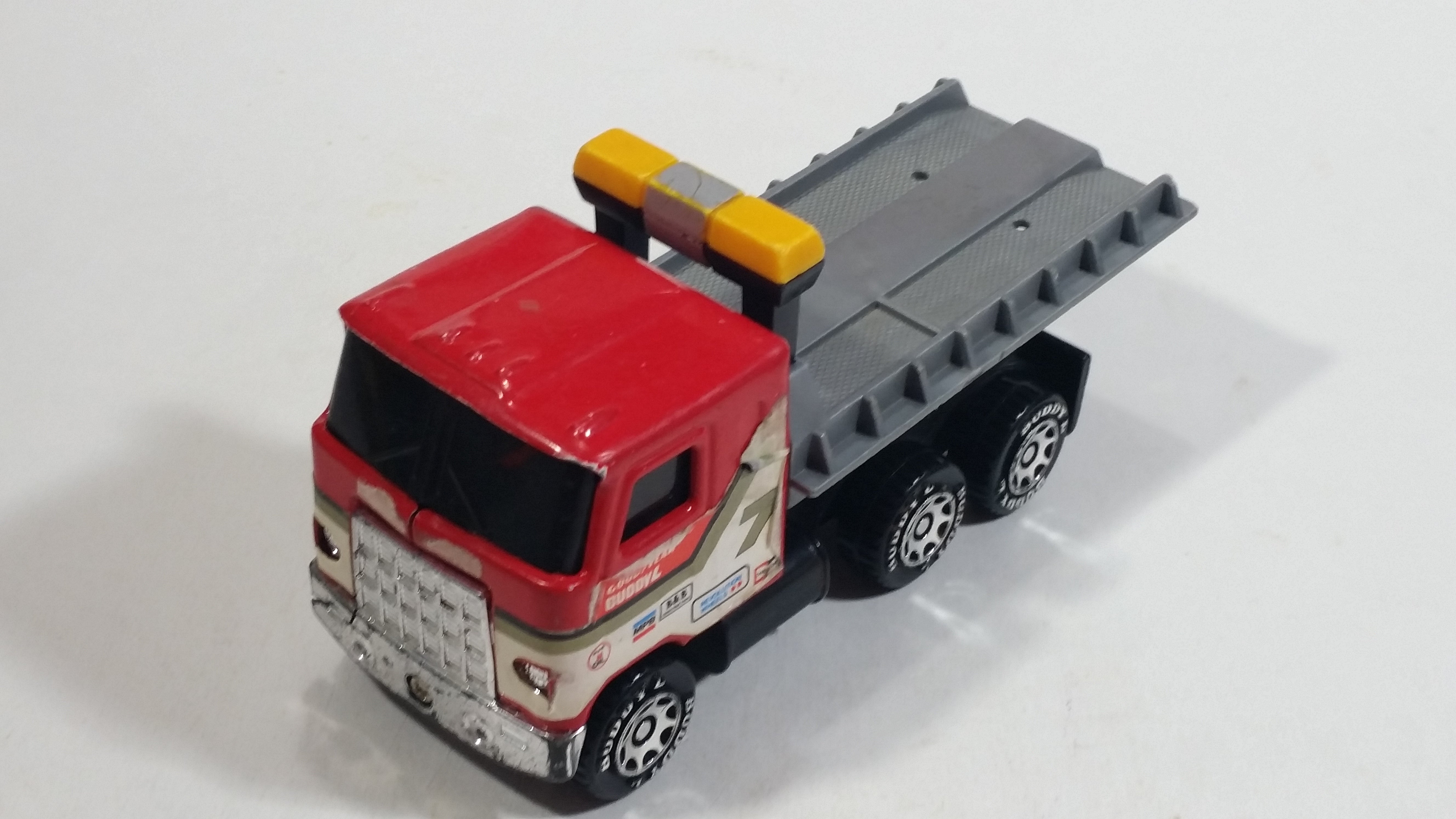Vintage 1980 Buddy L Mack Semi Good Year #7 Flatbed Tow Truck Red and Grey Pressed Steel and Plastic Toy Car Wrecking Salvage Vehicle - Macau 13