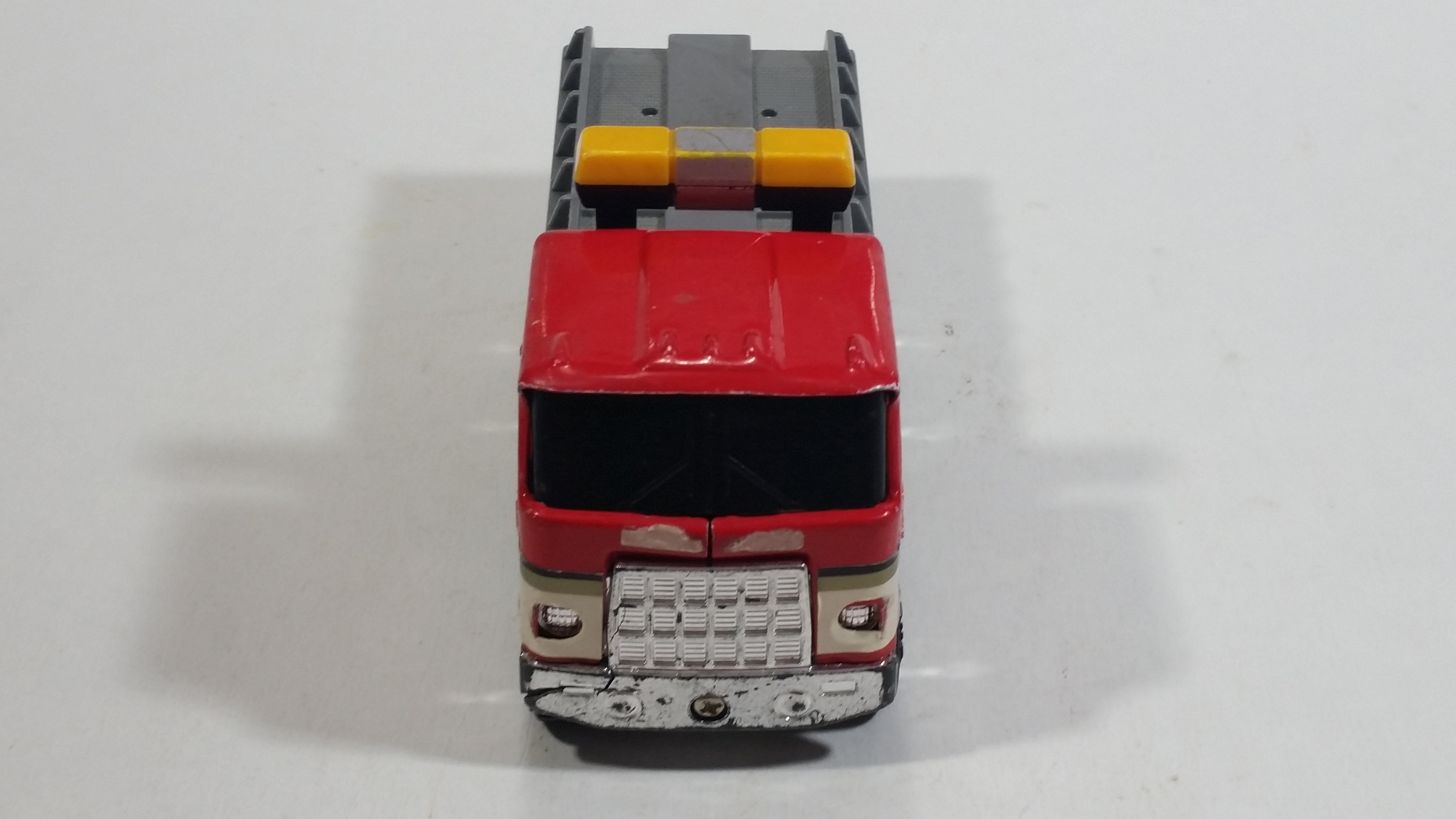 Vintage 1980 Buddy L Mack Semi Good Year #7 Flatbed Tow Truck Red and Grey Pressed Steel and Plastic Toy Car Wrecking Salvage Vehicle - Macau 14