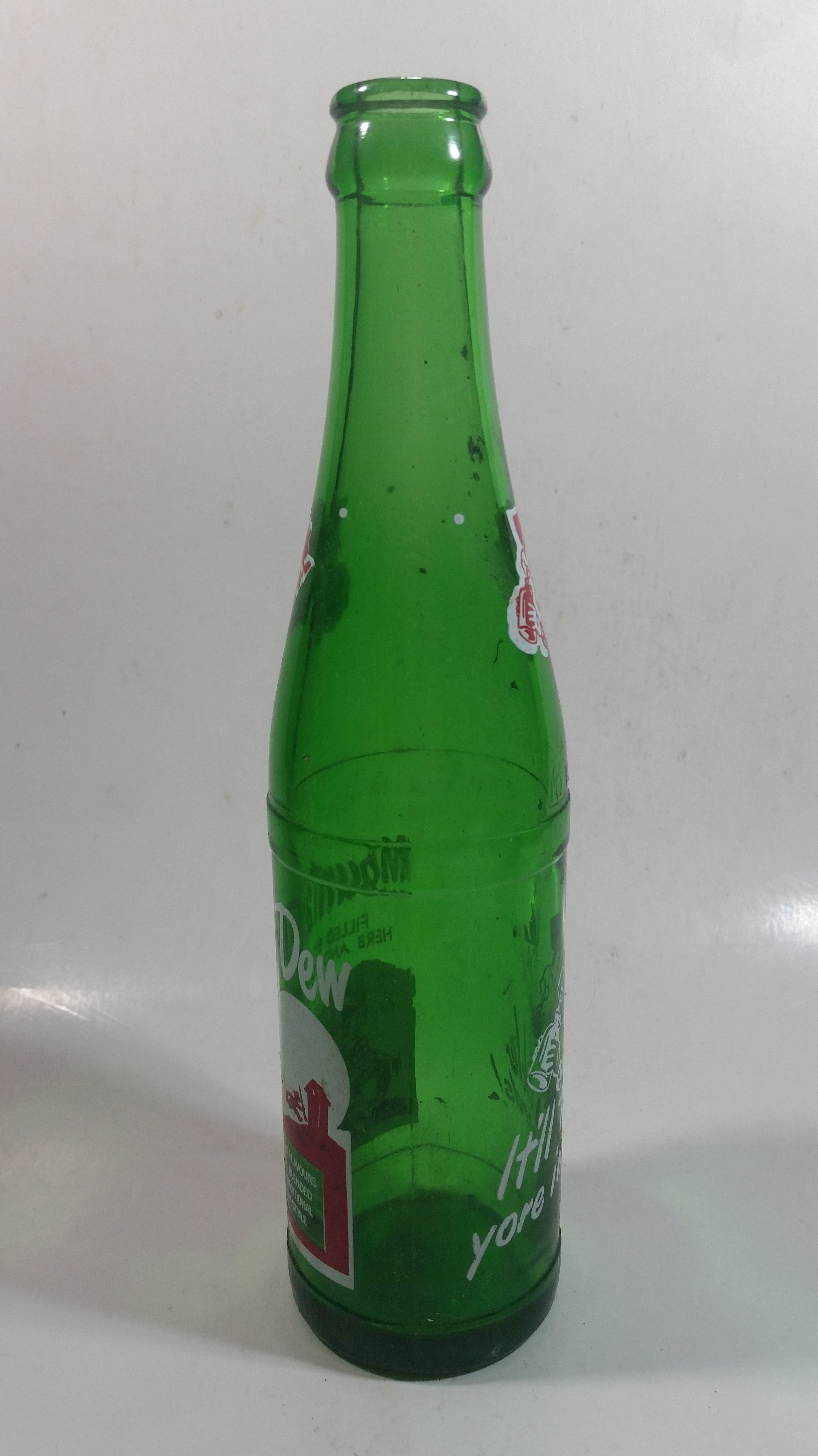 Vintage 1960s Mountain Dew Filled By Herb and Ruby "Hillbilly Style" Green Glass Soda Pop Beverage Bottle "It'll tickle your innards!" 3