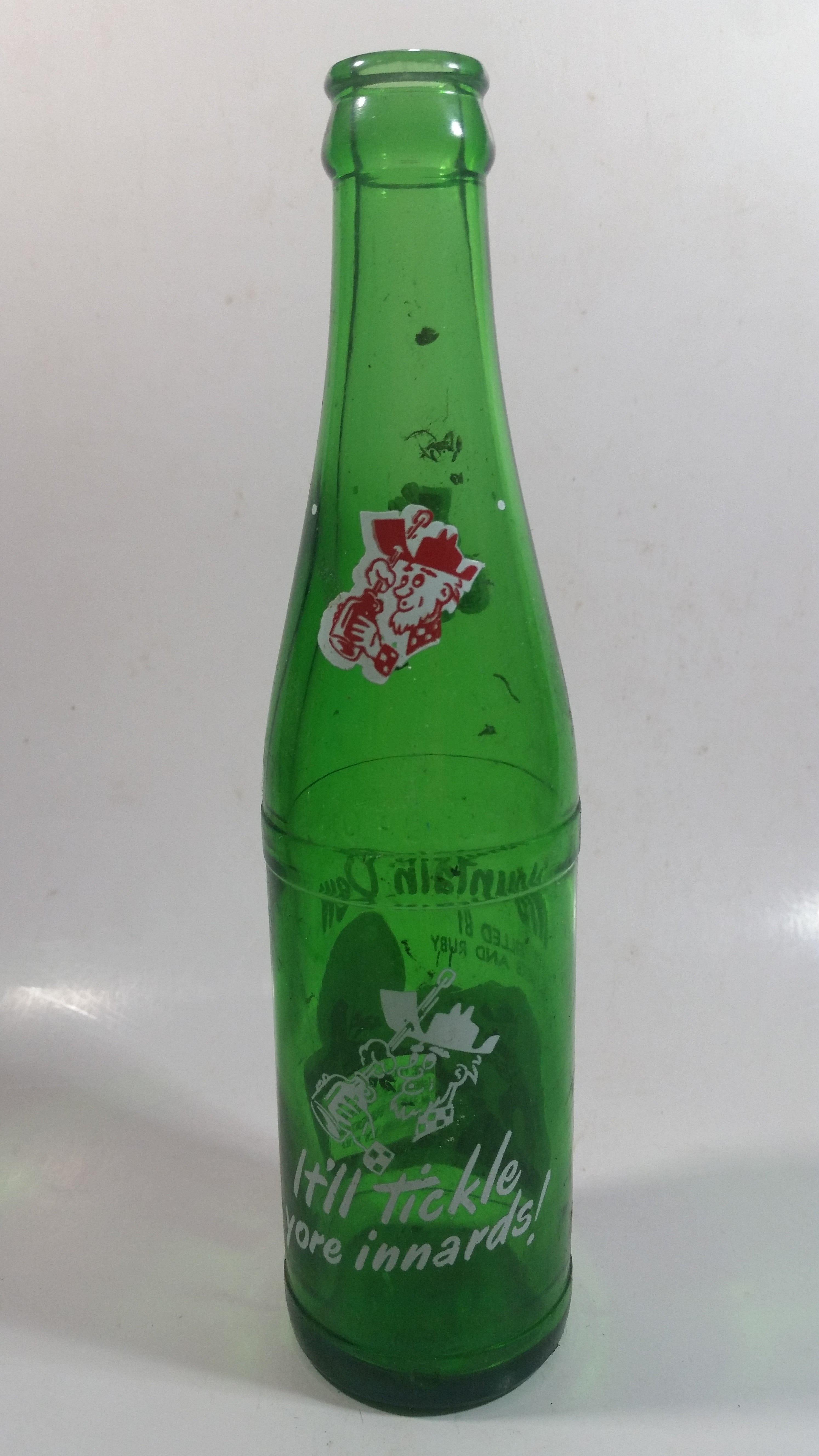 Vintage 1960s Mountain Dew Filled By Herb and Ruby "Hillbilly Style" Green Glass Soda Pop Beverage Bottle "It'll tickle your innards!" 5