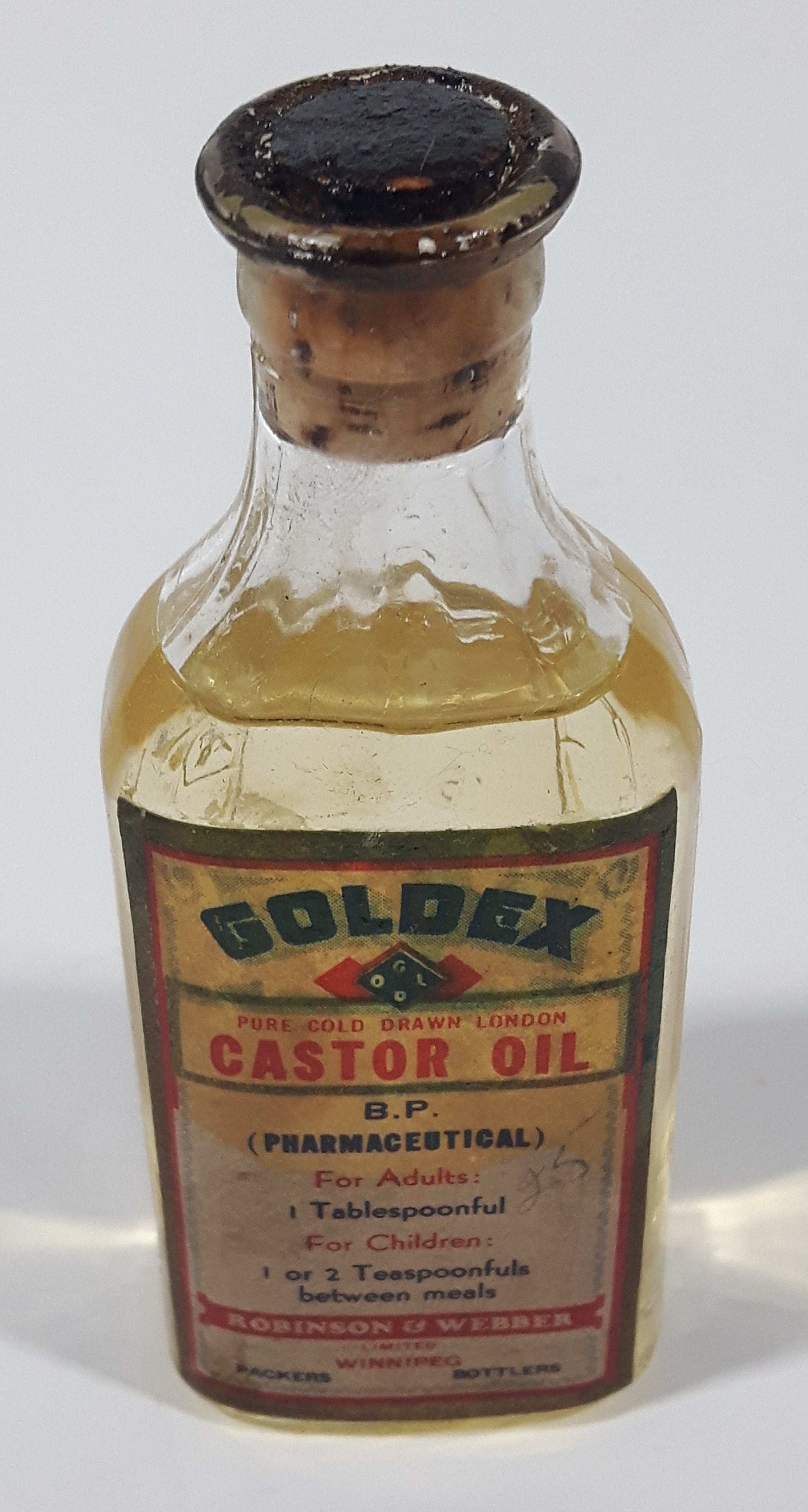 Antique Robinson & Webber Limited Winnipeg Packers Bottlers B.P. Pharmaceutical Goldex Gold Pure Cold Drawn London Castor Oil 4 1/2" Tall Glass Bottle with Cork Still FULL 11