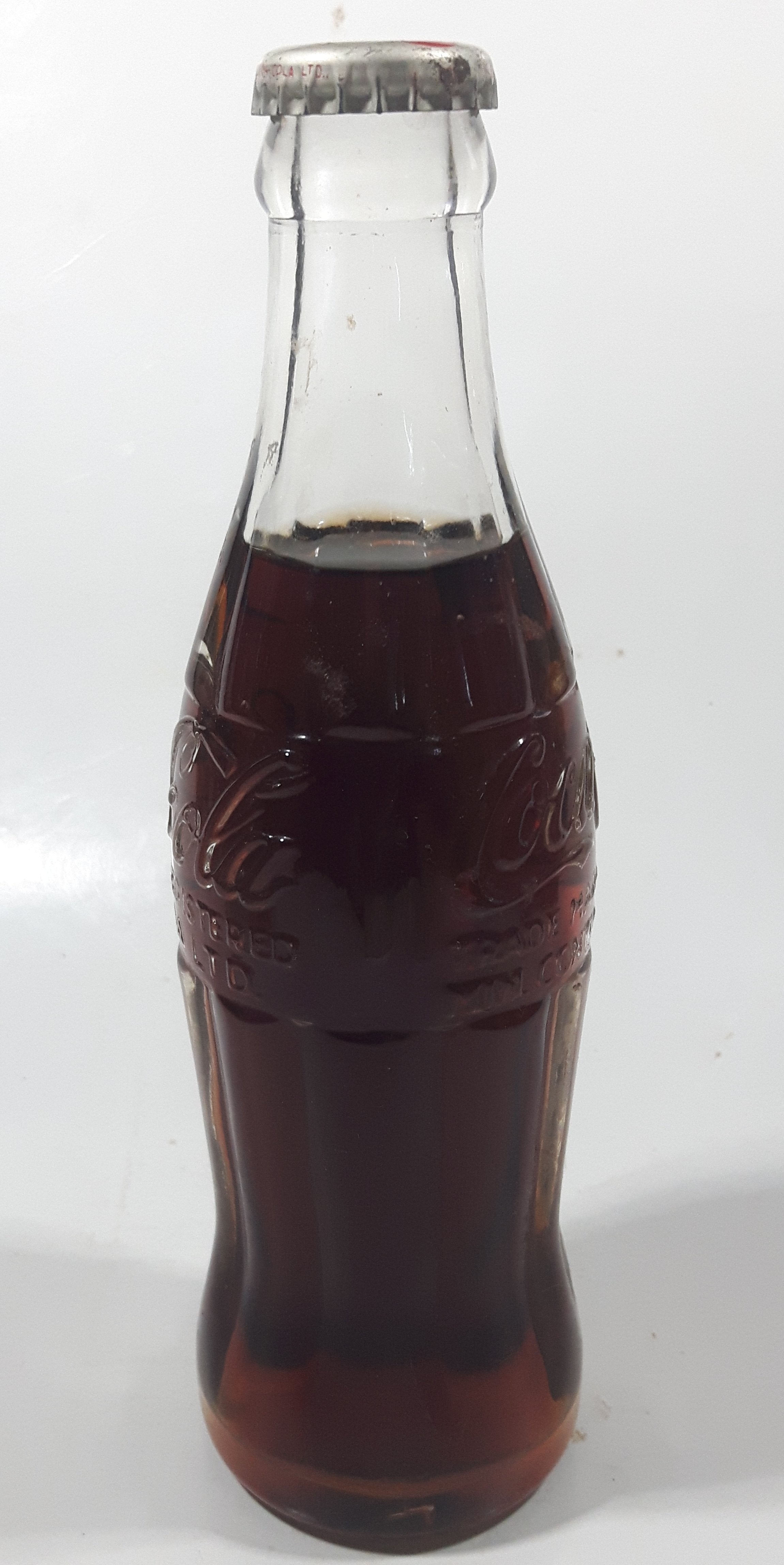 Vintage Coca-Cola 7 3/4" Tall 6oz Embossed Clear Glass Soda Pop Bottle Full Unopened 7