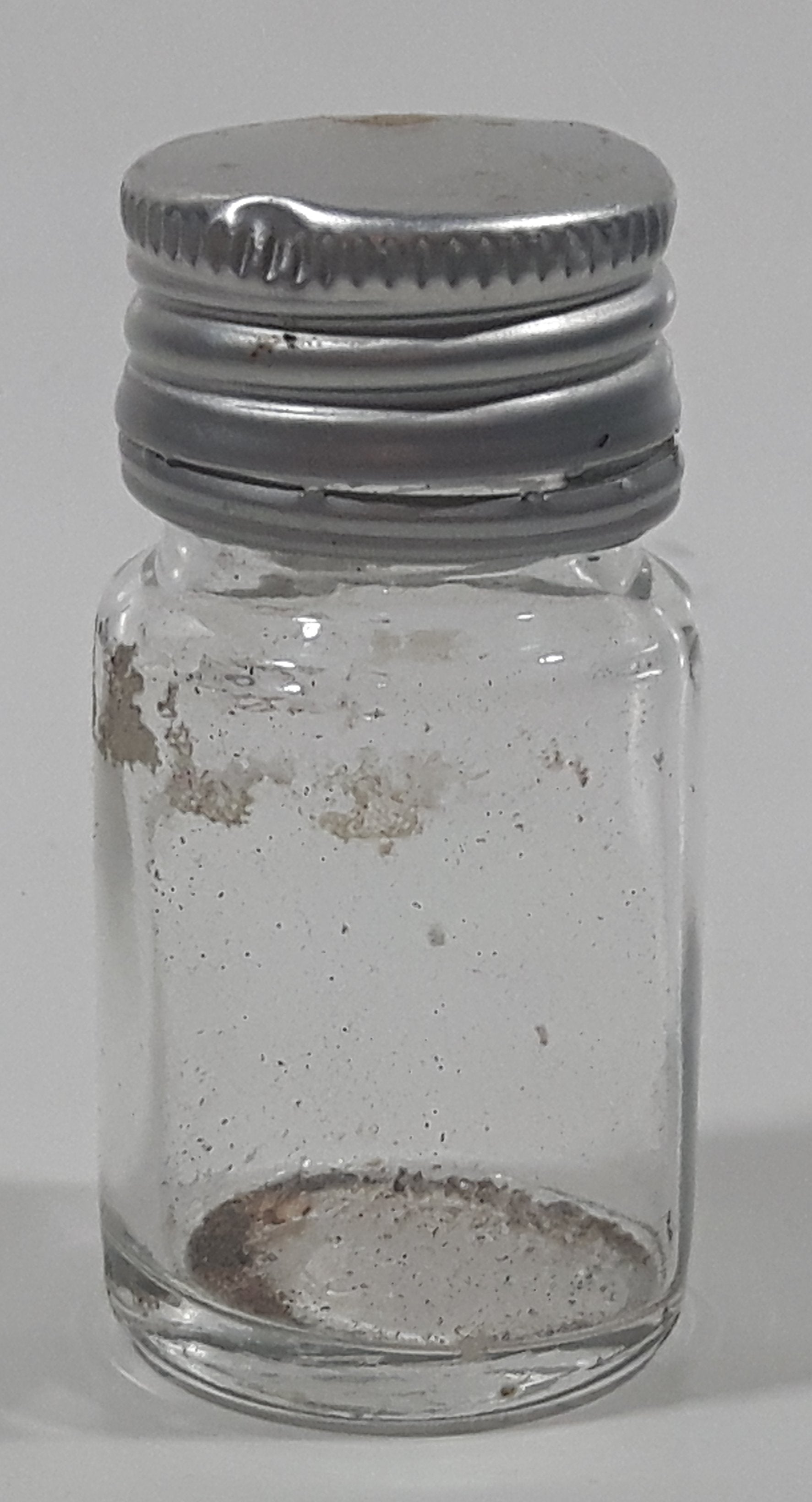 Vintage T-22 2 1/2" Tall Clear Glass Medicine Bottle with Metal Lid 4