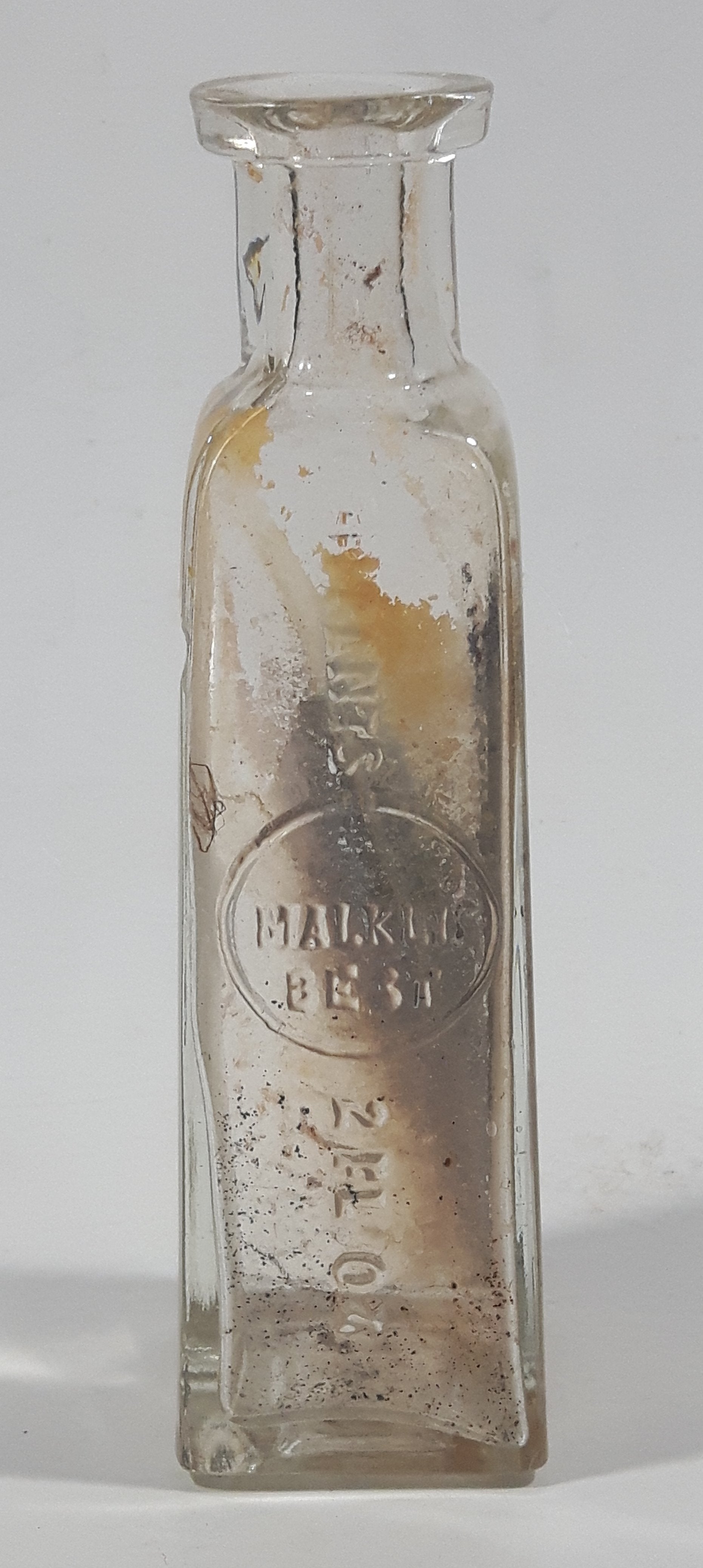 Vintage Malkin's Best Contents 4 Fl Oz 4 3/4" Tall Embossed Glass Cork Top Flavoring Bottle