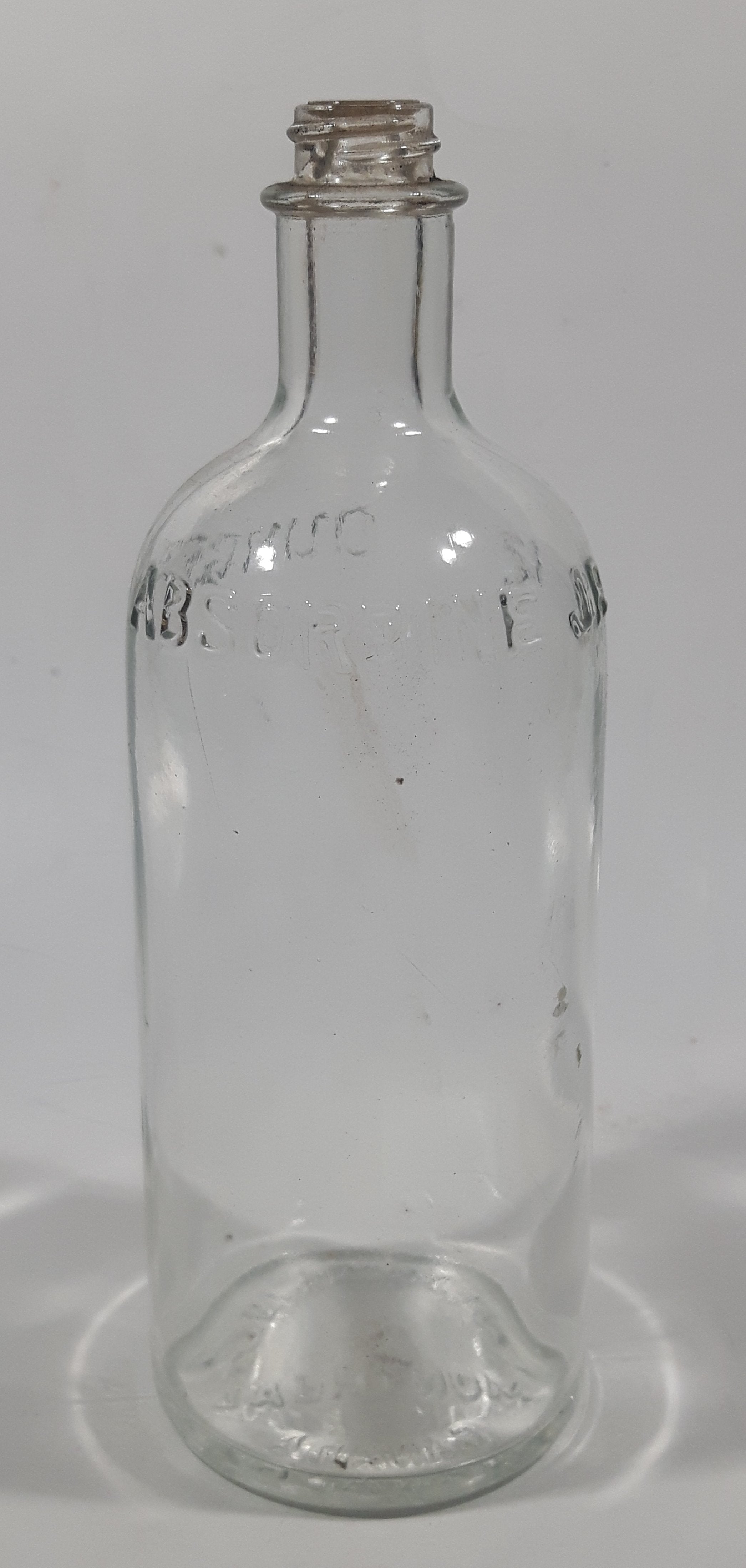 Antique W. F. Young Inc. Montreal Canada Absorbine Jr. 12 Fl Ounces Liniment 7 3/8" Tall Embossed Lettering Glass Bottle 3