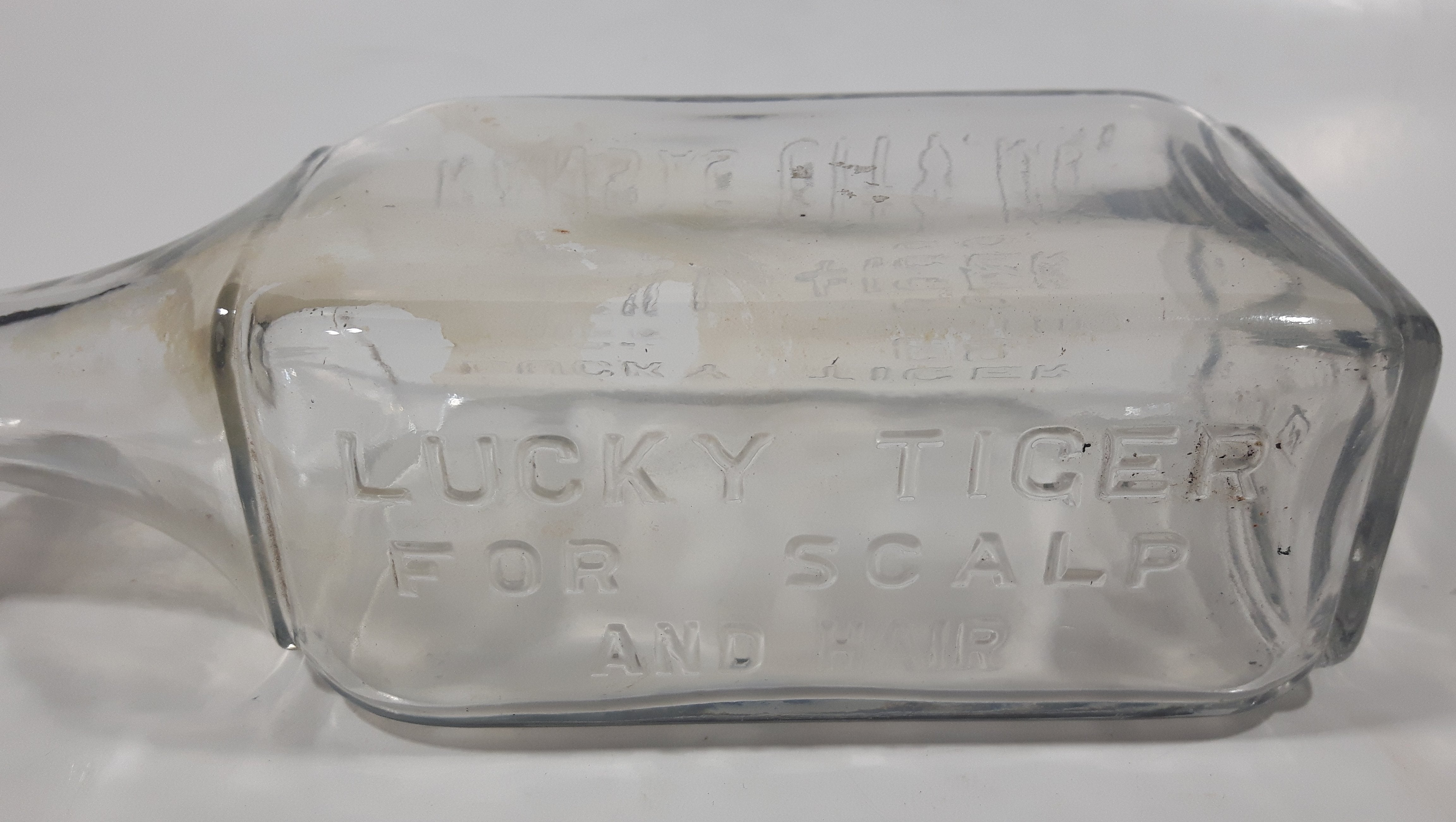 Antique Lucky Tiger Mfg. Co. Kansas City, Mo. For Scalp And Hair 7 1/2" Tall Embossed Lettering Glass Tonic Bottle 10