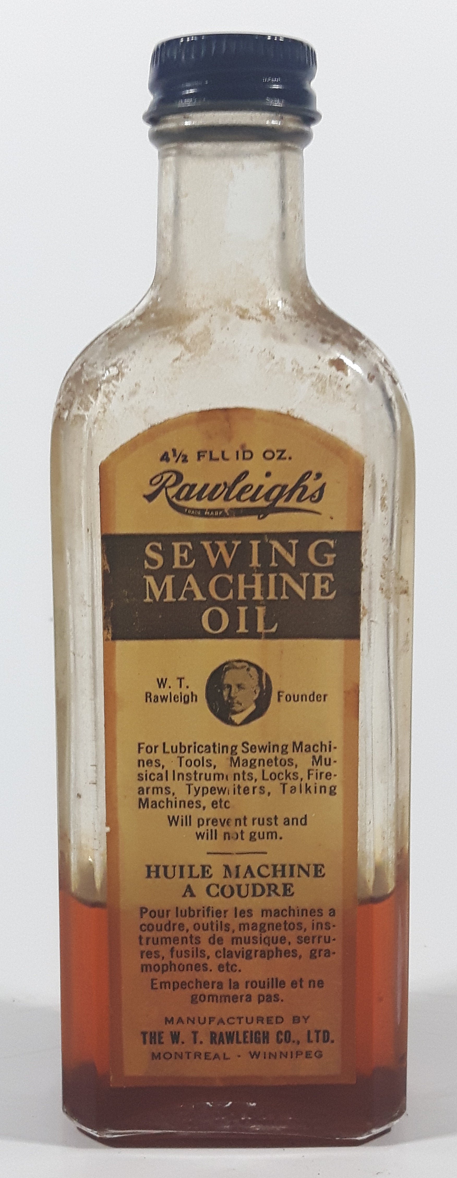 Antique Rawleigh's Sewing Machine Oil 4 1/2 Fluid Oz 6 1/2" Tall Glass Bottle with Paper Label