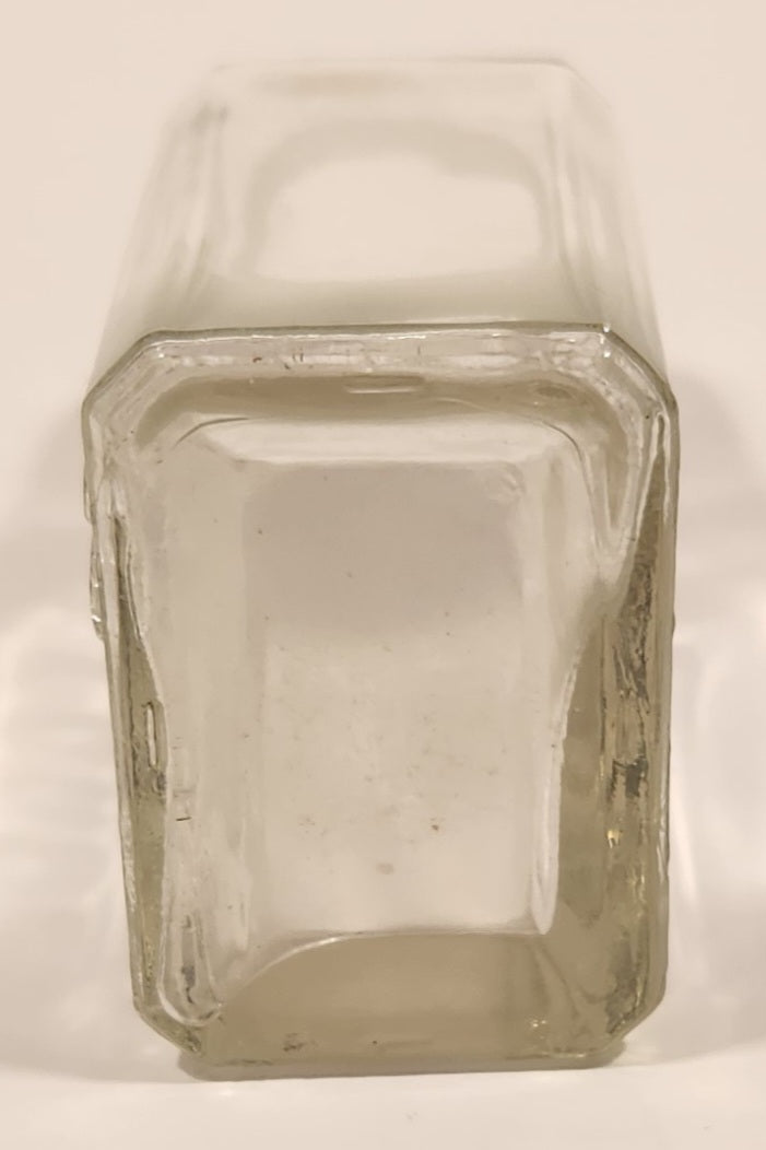 Vintage Kuowow's Powder Heavy Embossed Glass Bottle 6