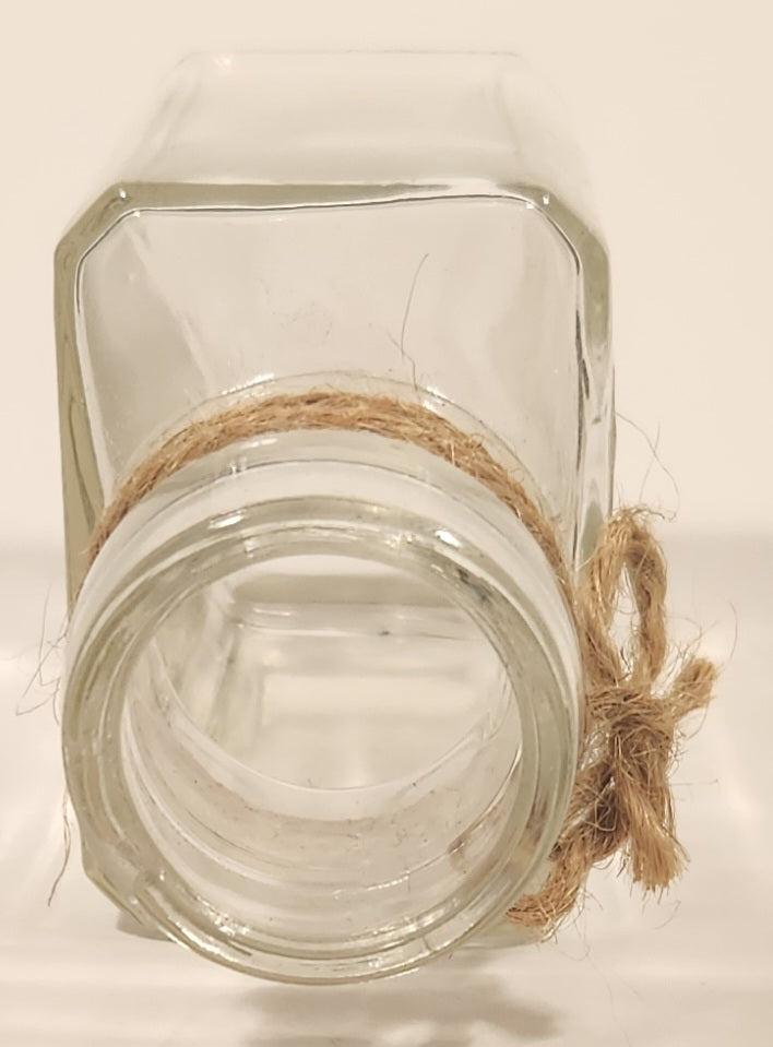 Vintage Kuowow's Powder Heavy Embossed Glass Bottle 7